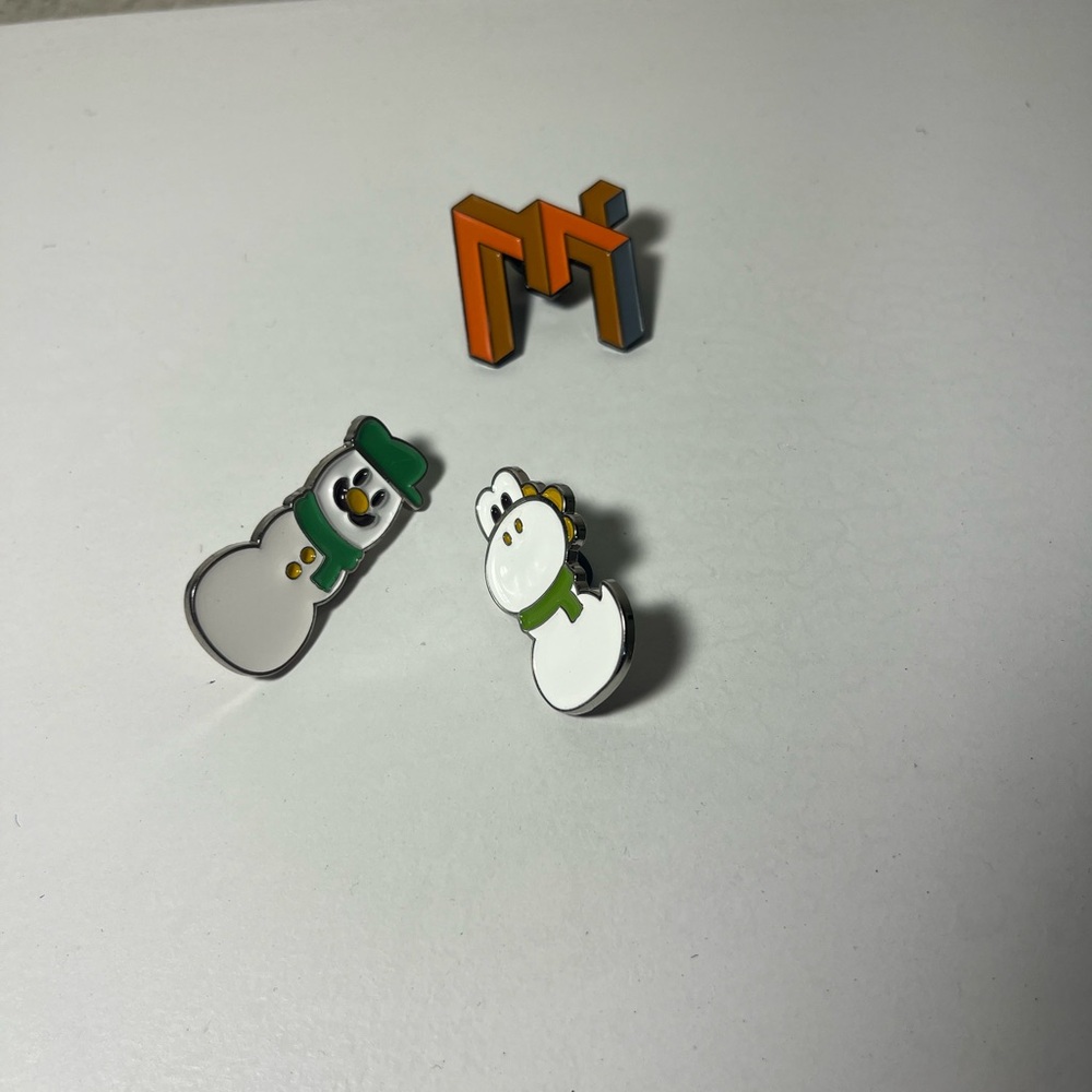 Set of three pins